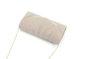 Close-up detail of glitter pleated evening clutch bag with gold chain strap texture.