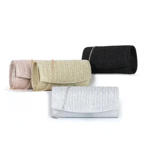 Detailed view of women glitter pleated evening clutch bag with chain strap for party.