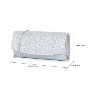 Silver glitter evening clutch bag detail showing size dimensions 20x10x6cm with chain.