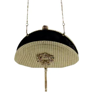 Elegant women semi-circular woven evening bag with rhinestone flower and chain strap.