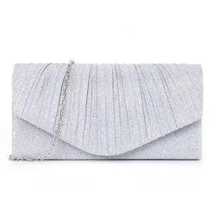 Silver glitter pleated clutch bag detail, elegant evening handbag metallic chain texture.