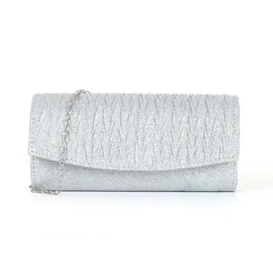 Detailed view of the silver glitter pleated clutch bag texture and delicate metal chain strap.