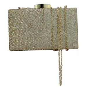Close-up detail view of the elegant rhinestone clutch featuring sparkling crystals and chain strap.