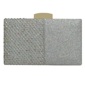 Silver rhinestone evening clutch bag detail showing sparkling glitter texture and clasp.