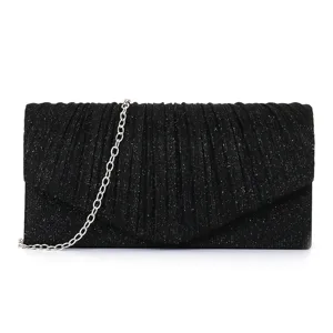 Black glitter evening clutch bag detail showing pleated texture and silver chain strap.