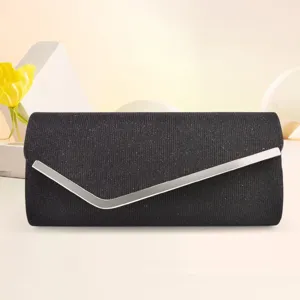 Black glitter evening clutch bag for women, elegant party handbag detail presentation view.