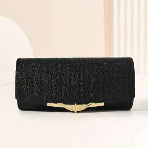 Elegant black glitter evening clutch bag with chic gold metal clasp for women party.