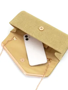 Elegant gold glitter clutch bag for women, featuring metallic chain and flap design for party.