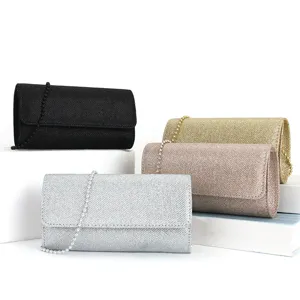 Élégant sac pochette de soirée pailleté avec bandoulière perle pour femme fête mariage.