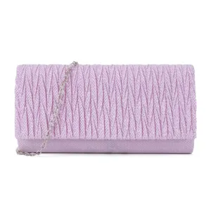 Glitter pleated evening clutch bag detail showing sparkling texture and silver chain strap.