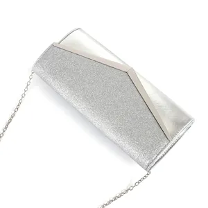 Silver glitter evening clutch bag with V-shaped metal accent, stylish shoulder crossbody bag.