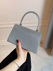 Sac de soirée argenté à paillettes pour femme, élégant sac à main de fête étincelant.