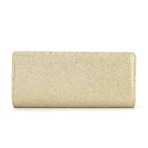 Gold glitter clutch bag detail, evening purse surface texture, elegant fashion style