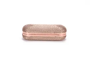 Detailed view of the elegant rose gold woven clutch bag with metal frame and latch closure.