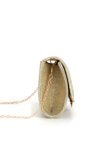 Detailed close-up view of elegant glitter evening clutch bag featuring stylish metallic chain.