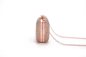 Rose gold woven PU hard clutch side detail view, elegant evening party handbag with chain strap.