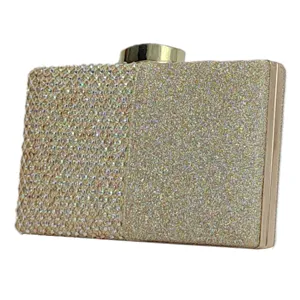 Elegant rhinestone evening clutch bag detail view, sparkling crystals and glitter surface for party.