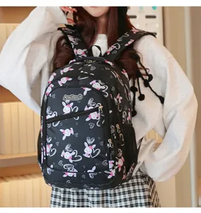 Detailed view of the cute rabbit print black student backpack, showing fine stitching and durable straps.