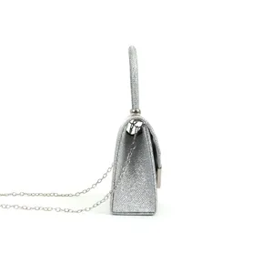 Sac de soirée pailleté argenté pochette vue de côté luxe mariage fête sac bandoulière femmes