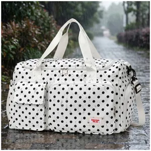 Sac de voyage à pois noirs et blancs, grand sac de sport imperméable pour femme.