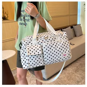 Grand sac de voyage à pois avec bandoulière, sac fourre-tout tendance pour femme et week-end.