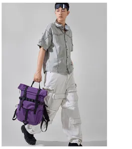 Detail view of the purple roll-top backpack showcasing its large capacity and durable fabric.