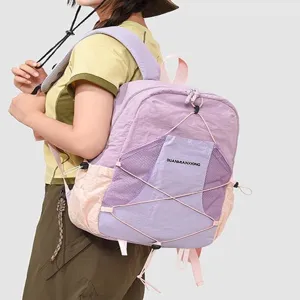 Leichter lila Rucksack für Damen und Studenten lässiger Outdoor Reise Daypack mit vorderer Netztasche