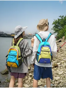 Outdoor travel color-blocking backpack detail showing straps and multi-pocket design for hiking.