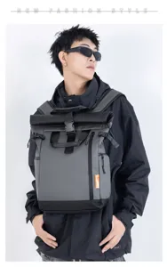 Detail view of men waterproof roll-top canvas backpack, color-block casual daypack.