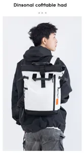 Men's casual waterproof Oxford cloth roll-top laptop backpack color-block school bag detail.