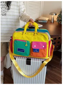 Kleurrijke colorblock reistas met trolleyhoes, ideaal voor korte trips, fitness en handbagage.