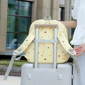 Sac à dos d'école à fleurs décontracté, joli sac de voyage avec sangle pour valise.