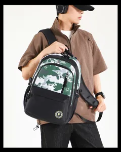 Camo patchwork casual laptop backpack for students, large capacity travel school bag.