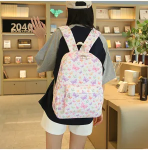 Mochila escolar bonita con estampado de mariposas y flores para estudiantes, uso diario.