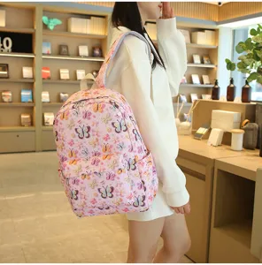 Mochila escolar de estudiante con estampado de mariposa rosa informal con amplios compartimentos