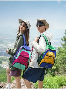 Outdoor travel color-block backpack, lightweight waterproof hiking daypack for men and women.