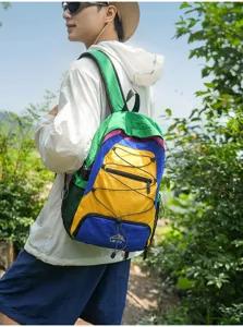 Detailed view of the colorful outdoor hiking backpack with multi-color blocking and mesh pockets.