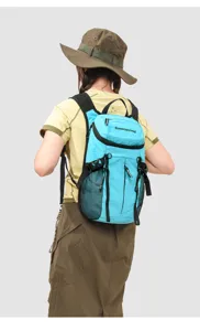 Detail view of lightweight hiking backpack with mesh side pockets and adjustable straps.