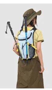 Lightweight hiking backpack for men and women, color-blocking design with trekking pole holders.