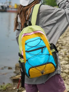 Outdoor color-blocking travel backpack, lightweight hiking daypack for men and women.