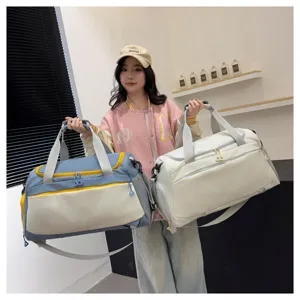 Grand sac de sport de voyage avec compartiment chaussures pour fitness et yoga.