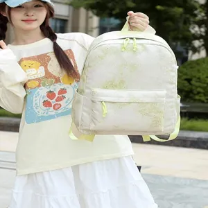 Sac a dos d'etudiant en toile avec motif degrade vert et etoiles, leger et decontracte pour filles.