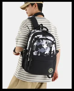 Casual color block backpack for students, large capacity computer travel school bag for daily use.