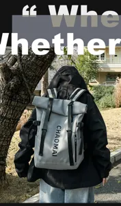 Outdoor street style roll top waterproof backpack detail view with durable straps and pocket.