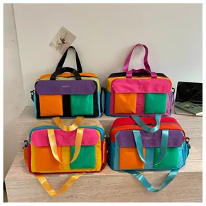 Color-blocking travel duffel bag, casual weekend luggage bag for women, gym and yoga bag.