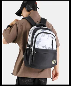 Casual waterproof school backpack for students, large capacity laptop travel daypack.