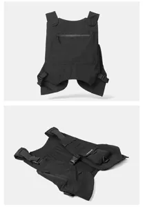 Functional tactical vest chest bag detail, black streetwear utility rig with multiple pockets.