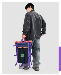 Detailed view of the colorblock outdoor backpack, showing multi-strap design and sturdy build.