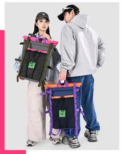 Casual color-blocked outdoor backpack with large capacity, roll top and multi-pocket design.