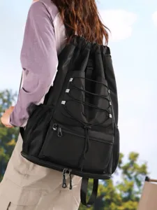 Grand sac à dos de sport imperméable avec cordon et multiples poches pour la gym et fitness.
